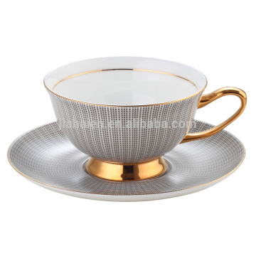 fashion decal porcelain cup and saucer with gold hand